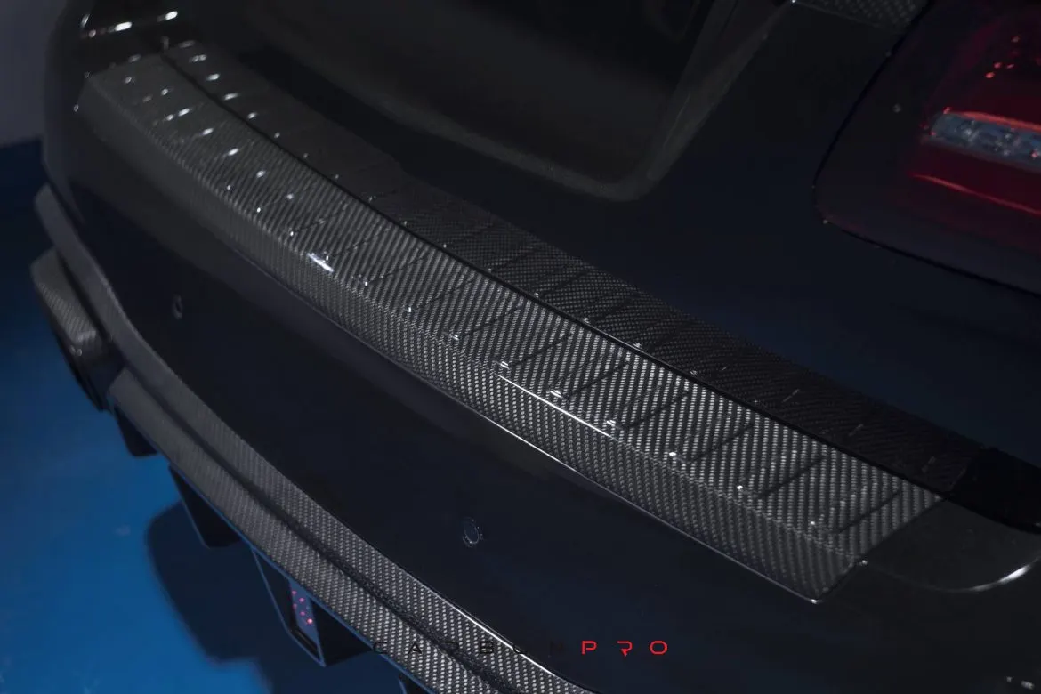 Carbon add on for rear bumper