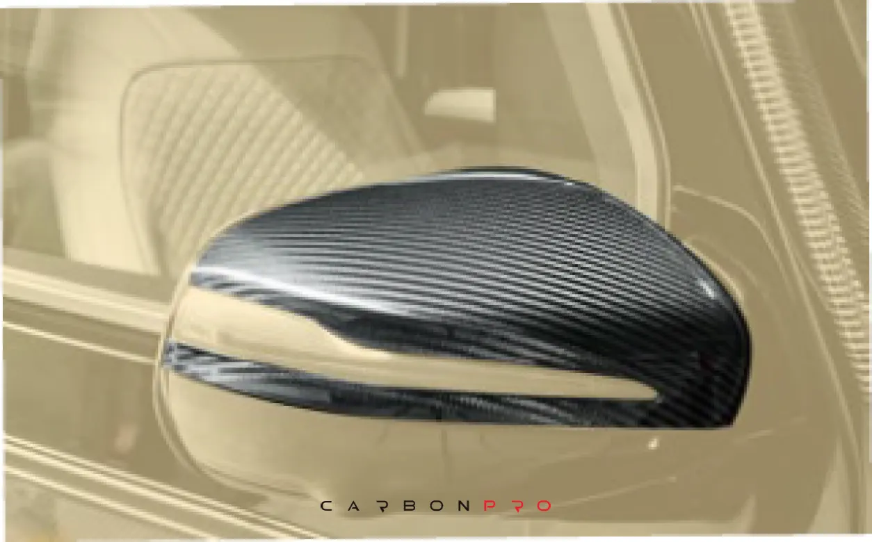 Carbon mirror housing