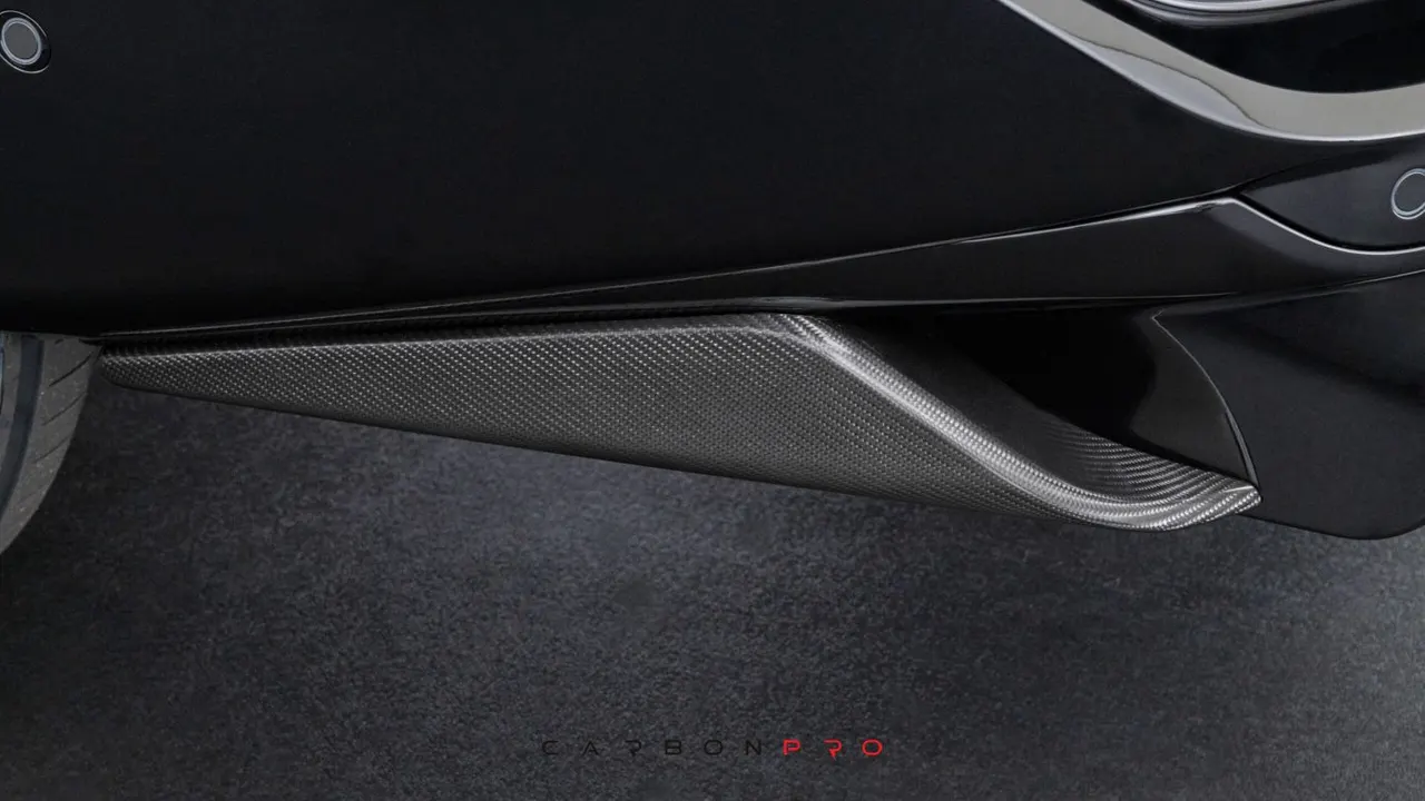 Carbon rear skirt attachment