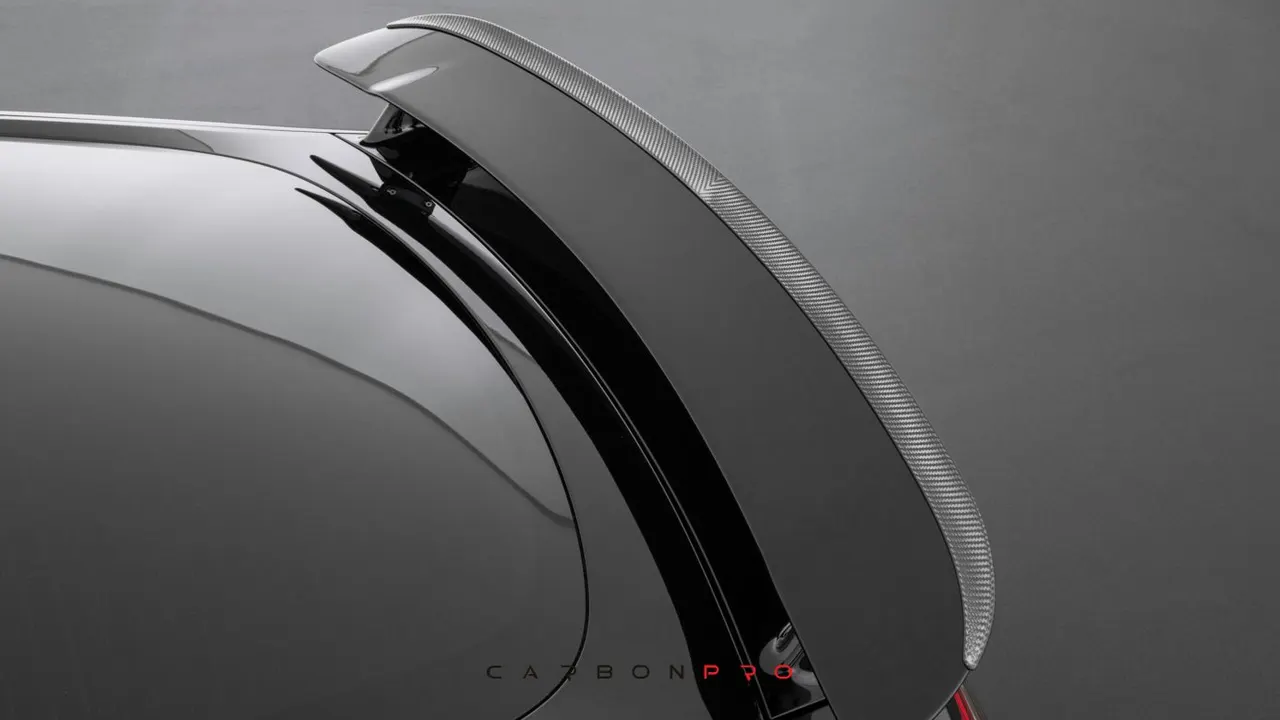 Carbon rear wing attachment