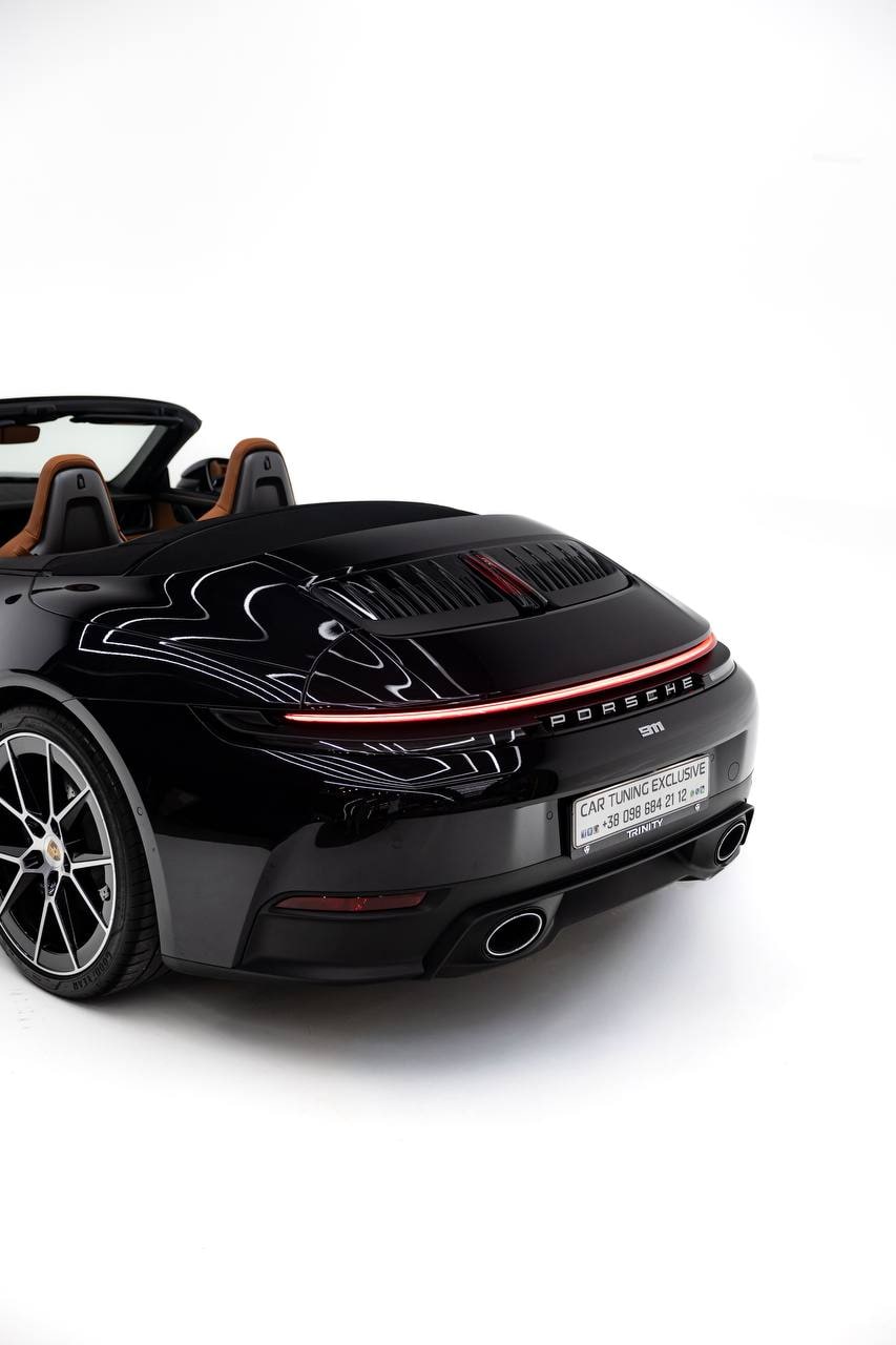Porsche 911 Cabriolet — Black / Tan