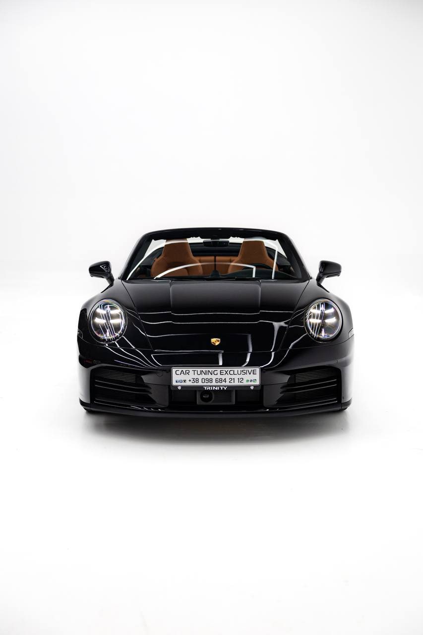 Porsche 911 Cabriolet — Black / Tan