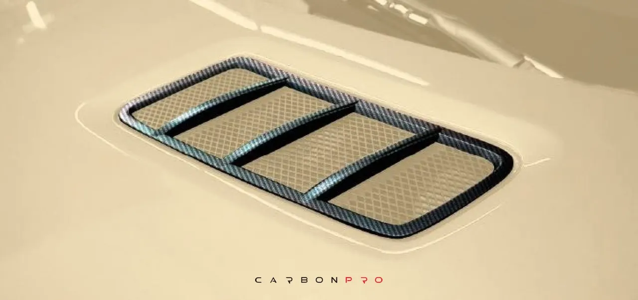 Carbon hood vents