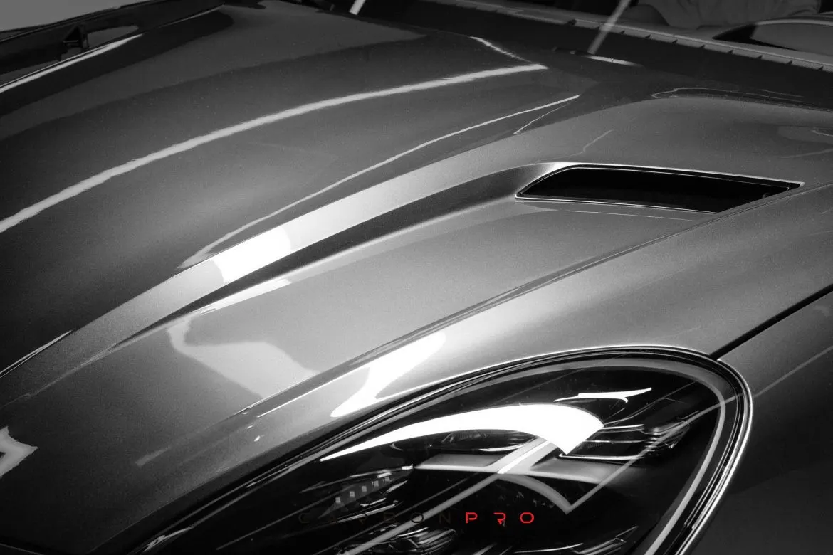 Hood with air intakes