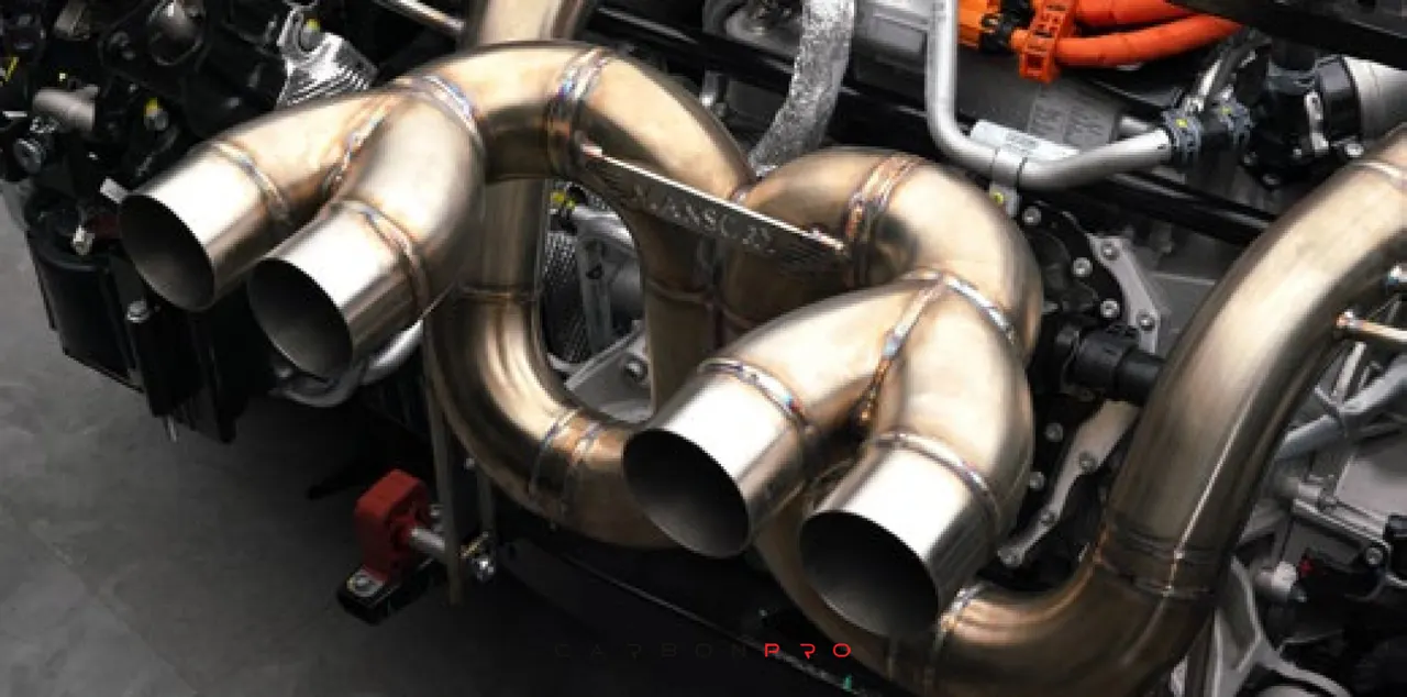 Rear muffler with flap control