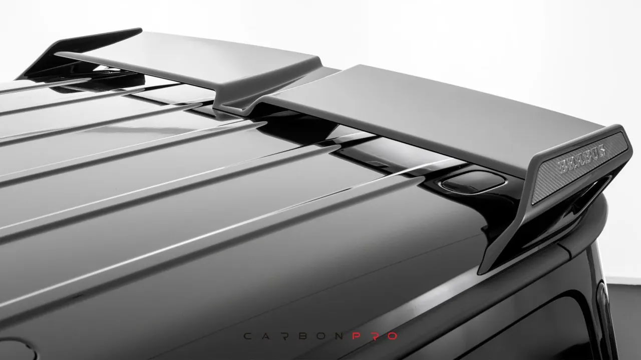 Rear spoiler with carbon inserts