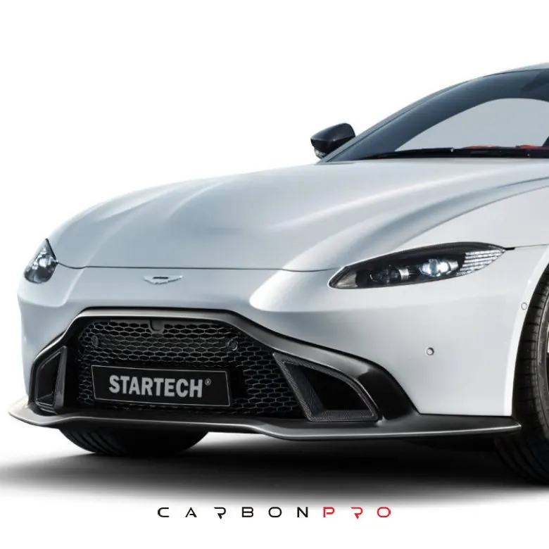 Performance front grille including carbon air intakes