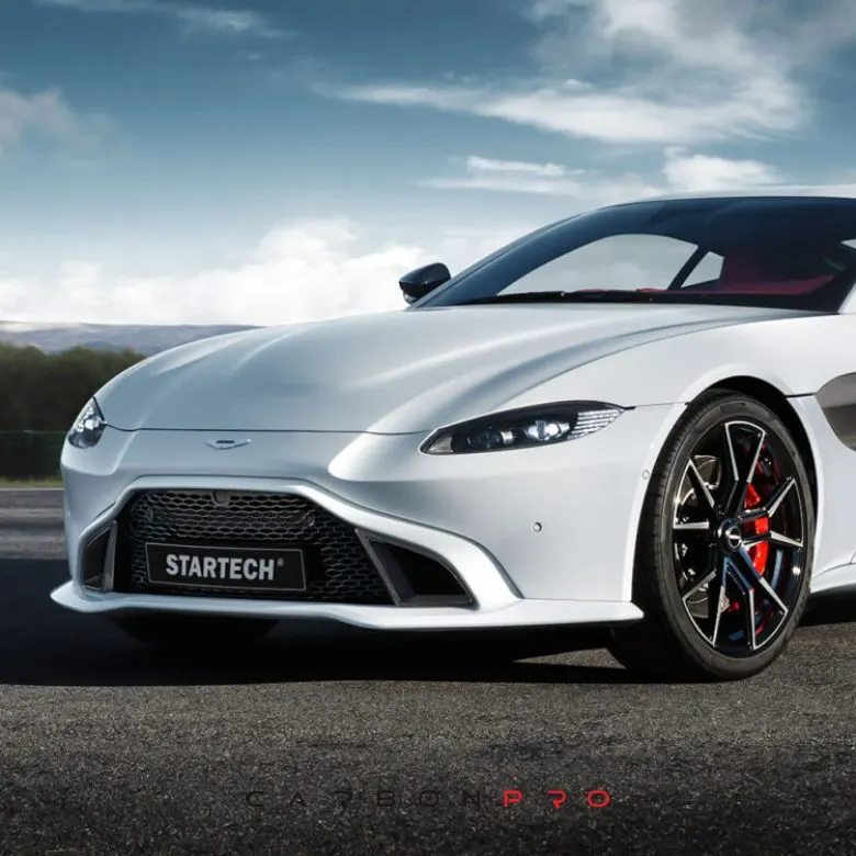 Performance front grille including carbon air intakes