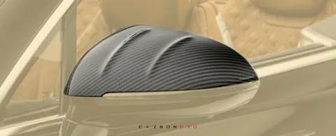 Carbon mirror housing