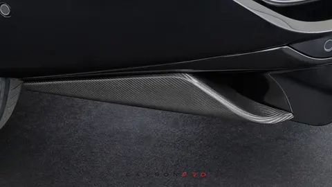Carbon rear skirt attachment