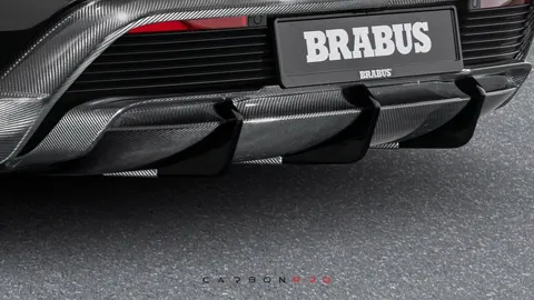 Carbon rear skirt insert