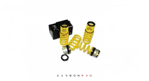 HYDRAULIC ADJUSTMENT IN COMBINATION WITH SUSPENSION SPRING