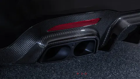 Sport exhaust system with actively controlled flaps