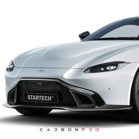 Performance front grille including carbon air intakes