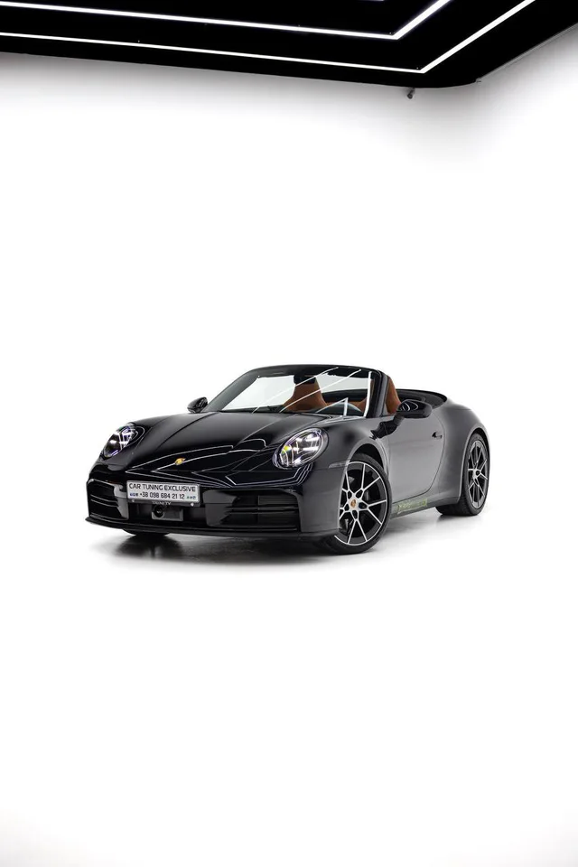 Porsche 911 Cabriolet — Black / Tan